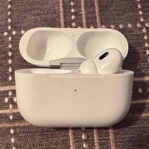 Apple AirPods Pro Case and Right Earbud